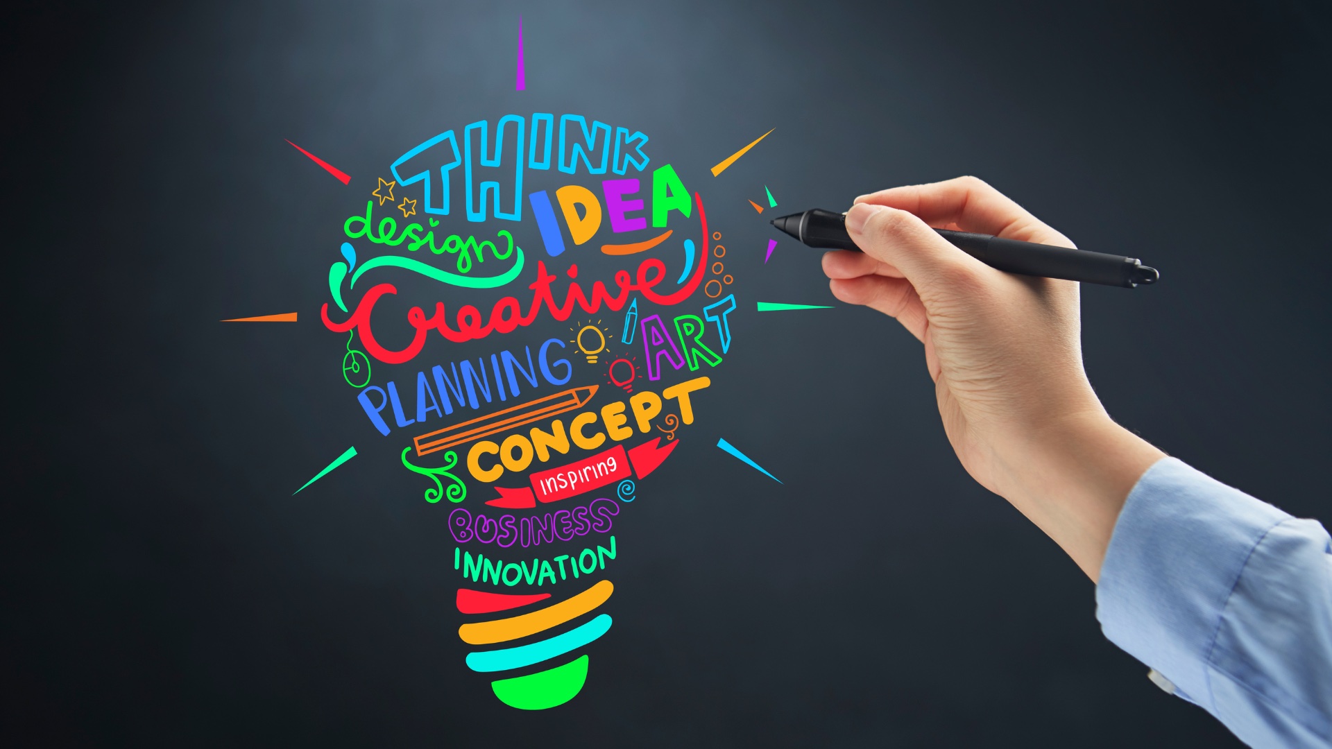 hand using digital pencil to draw a lightbulb